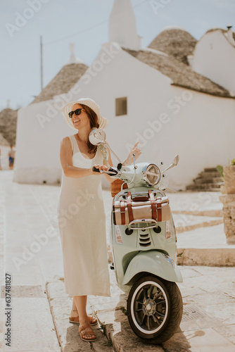 A young woman in a white dr...