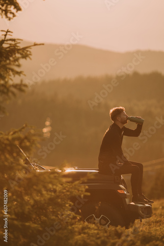 Young man relaxing on a ter...