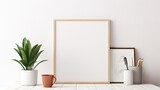 Illustration of a mockup poster with a wooden frame, plant, books, cup, and trendy decor on a white wall background.