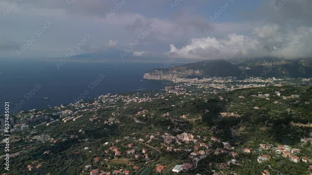 Aerial Drone View of Sorrento Italy. Warm Sunset Light during Golden Hour, with Mount Vesuvius Aerial Drone View of Sorrento Italy. Warm Sunset Light during Golden Hour, with Mount Vesuvius