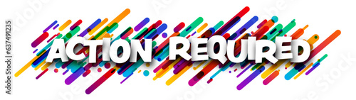 Action required sign over colorful brush strokes background.