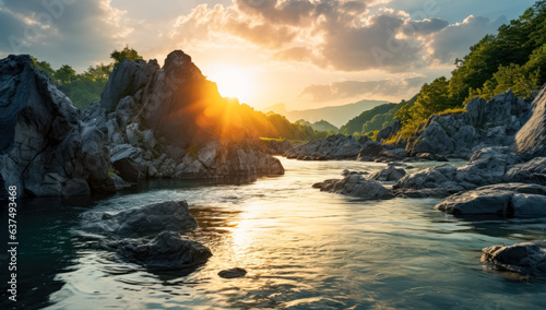 Sunrise over a river with rocks along the river, sunshine on the river by sunrise, gold and beige, a river with rocky edges and rocks at sunse.