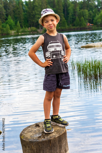 little child fishing on the lake