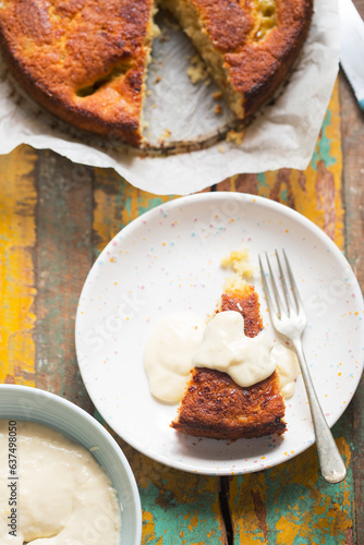Gooseberry cake with icing sugar with vanilla custard 