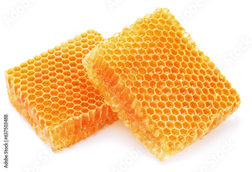 Fresh yellow honeycombs isolated on white background. Cells of the bee made structure contains honey.