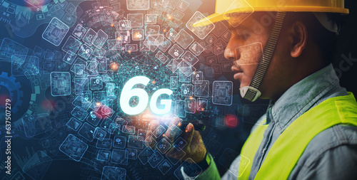 engineer or businessman Use a smartphone with 6g internet speed to exchange industrial systems, technology, industrial cloud technology concept photo