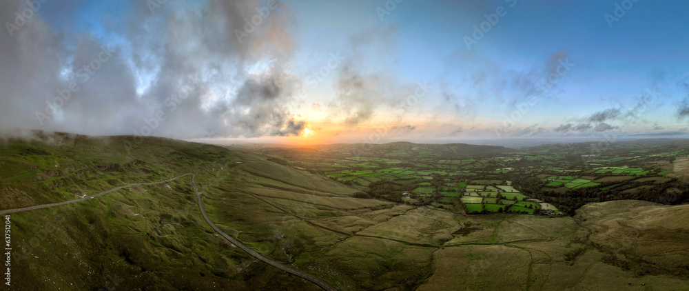 Sunset over the western edge of the Black Mountain in Carmarthenshire, South Wales UK
 - obrazy, fototapety, plakaty 