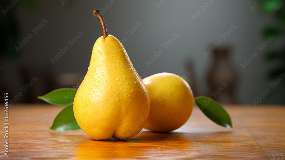 Two fresh pears with green leaves