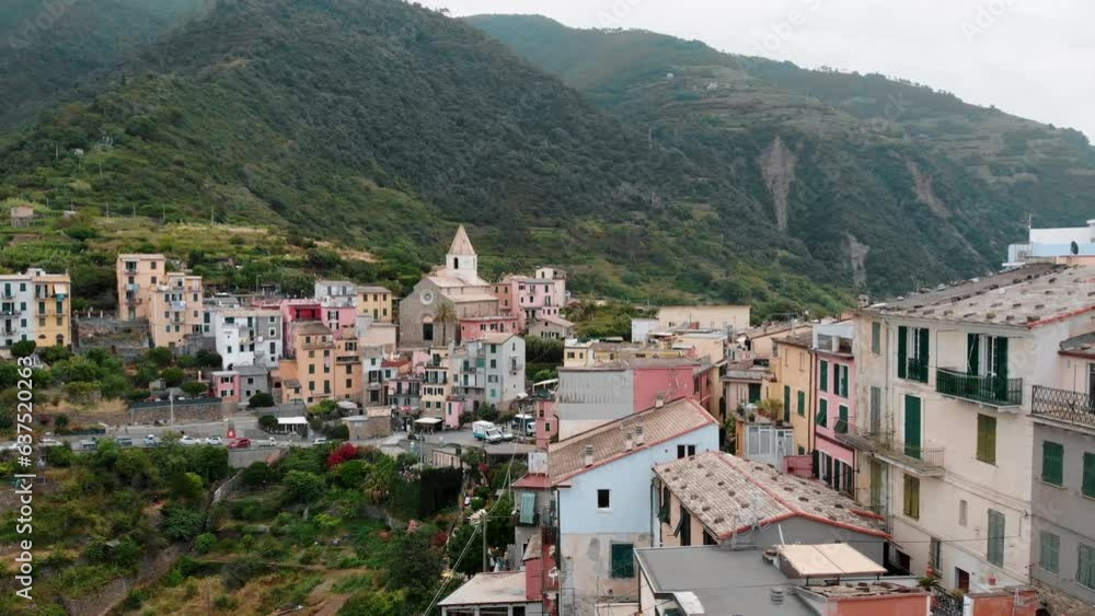 Village of Corniglia in aerial view, Cinque Terre coast of Italy. small town in the province of La Spezia, in Liguria, in northern Italy and one of the Cinque Terre attractions. Village of Corniglia in aerial view, Cinque Terre coast of Italy. small town in the province of La Spezia, in Liguria, in northern Italy and one of the Cinque Terre attractions.