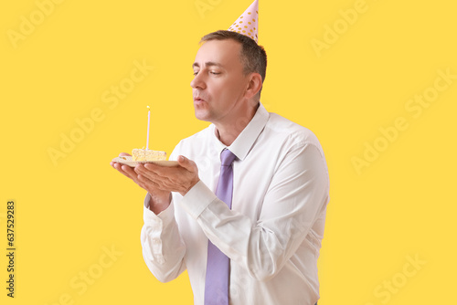 Mature man with piece of bi...