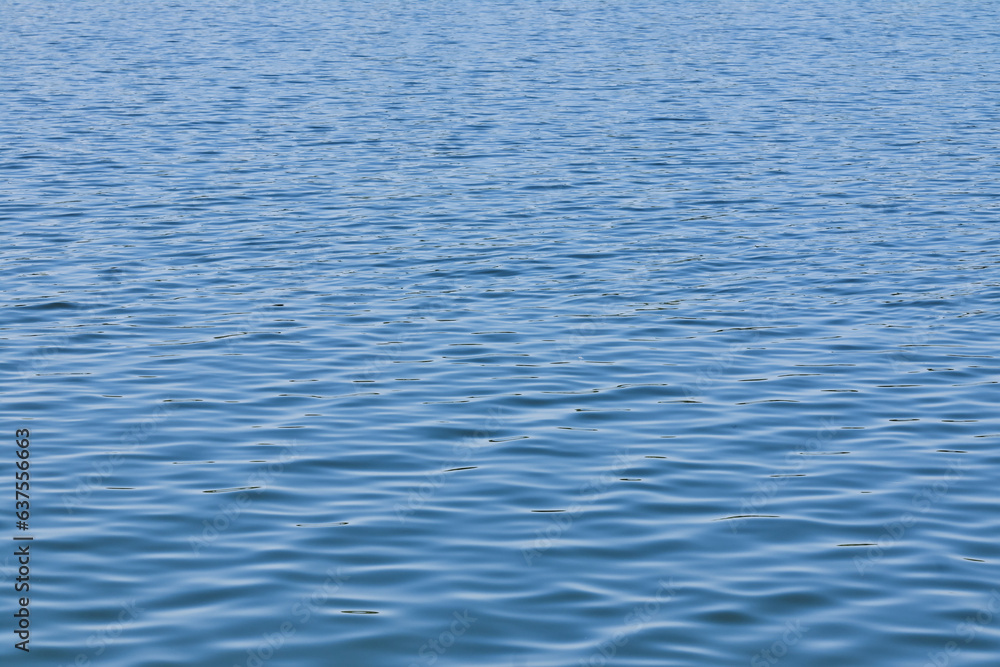 Calm ripple on water surface. River, lake, pond, sea pure blue water. Calm ripple on water surface. River, lake, pond, sea pure blue water.