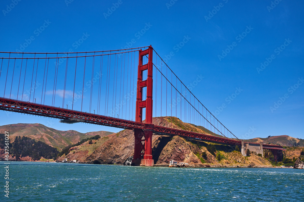 Side view of Golden Gate Bridge from choppy San Francisco Bay waters
