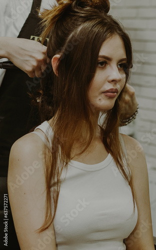 Portrait of a young girl at the hairdresser. photo