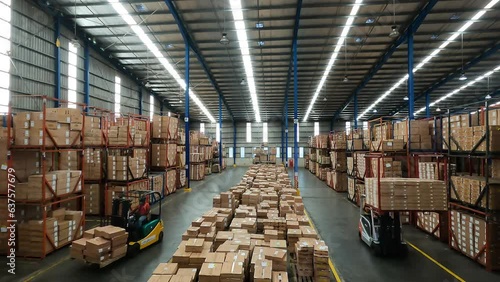 Timelapse Warehouse Lift Trucks Stacking Boxes