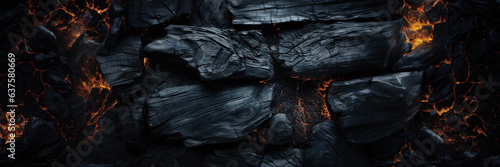 Burnt wooden texture with fire, banner photo