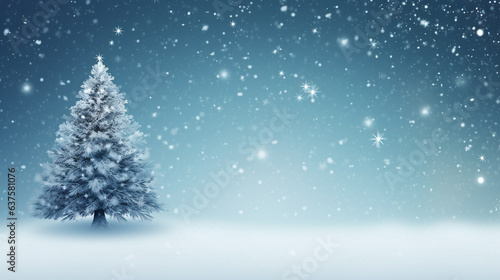 lighted isolated christmas tree in idyllic blue snowy landscape, greeting card banner concept with copy space for december holiday season, christmas background © © Raymond Orton