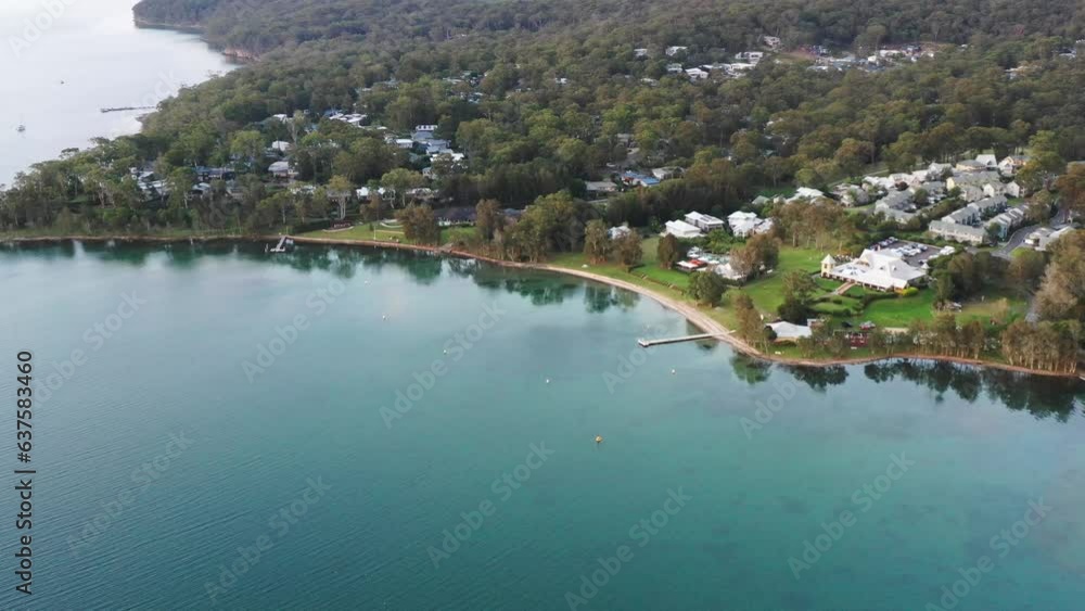 Boat jetty on Lake Macquarie at Murrays beach lakeshore in aerial top down 4k.
Boat jetty on Lake Macquarie at Murrays beach lakeshore in aerial top down 4k.