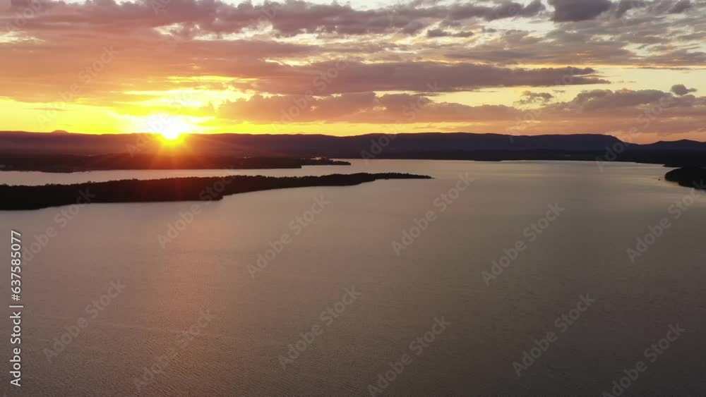 Macquarie lake aerial panorama at sunset from West to Murrays beach 4k.
Macquarie lake aerial panorama at sunset from West to Murrays beach 4k.