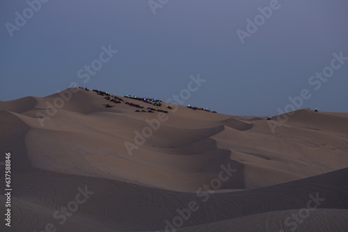Group of vehicles gathering at the top of Competition Hill in the Glamis section of the Algodones Sand Dunes photo