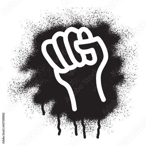 Stencil graffiti raised fist with black spray paint