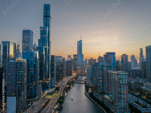 Aerial view of the downtown city Chicago River during sunset. Illinois, USA. 2023