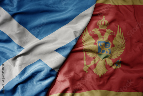big waving national colorful flag of scotland and national flag of montenegro .