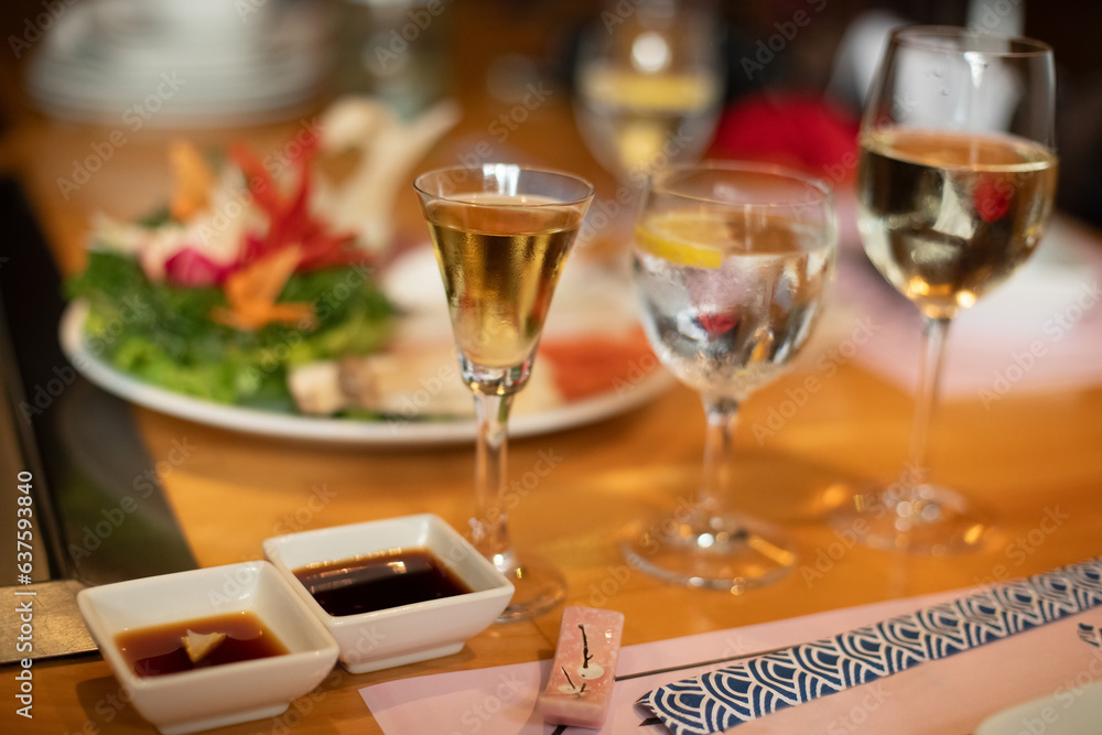 table with glasses and fresh vegetables