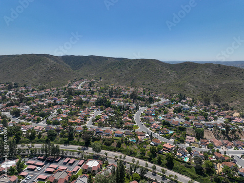 Aerial view of small city Poway in suburb of San Diego County, California, United States. Houses next the valley