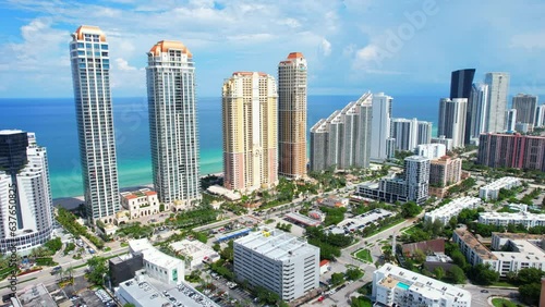 Sunny Isles Beach Florida. Panorama of Miami Beach FL. Atlantic Ocean beach. Beautiful seascape. Turquoise color of sea water. Summer vacation in Florida. Aerial view on Hotels and Resorts on Island