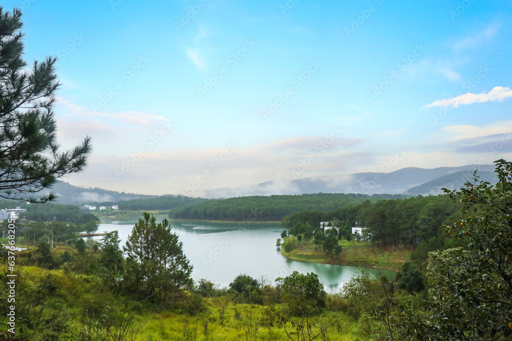 Calm lake in the middle of the green mountains, south asia