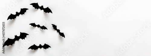 Bat silhouettes on the white wall. Halloween banner with place for text © Diana Vyshniakova