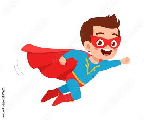 little kid wearing super hero costume and feel happy