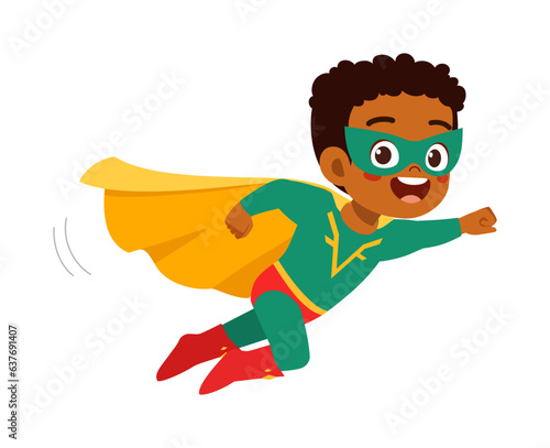little kid wearing super hero costume and feel happy