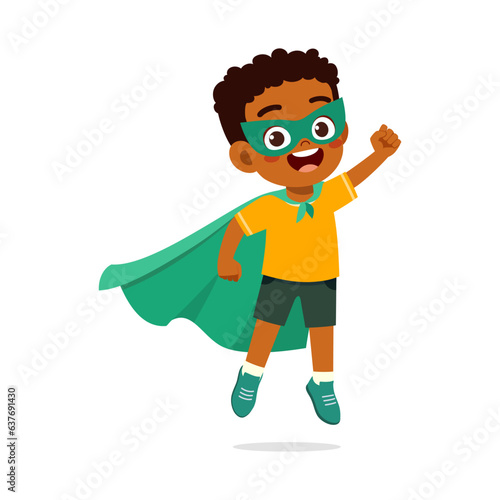 little kid wearing cape and pretending being super hero
