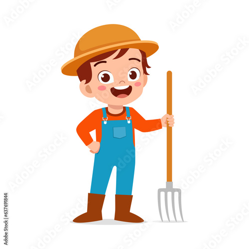 little kid wearing farmer costume and holding pitchfork
