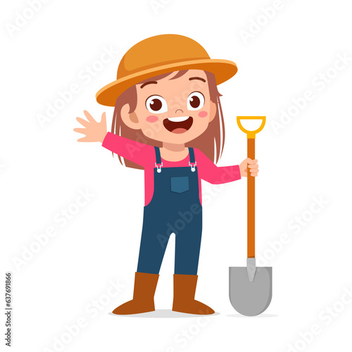 little kid wearing farmer costume and holding shovel