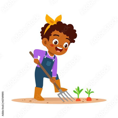 little kid planting carrot and feel happy