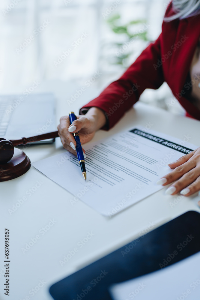 The lawyer with a client discussing contract paper, a Business lawyer working about legal legislation in the courtroom to help their customer, contract and agreement concept. The lawyer with a client discussing contract paper, a Business lawyer working about legal legislation in the courtroom to help their customer, contract and agreement concept.