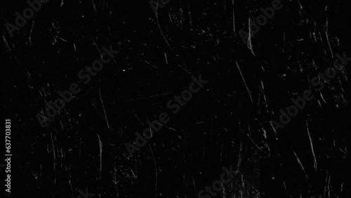 An old film overlay with scratches in a seamless loop.