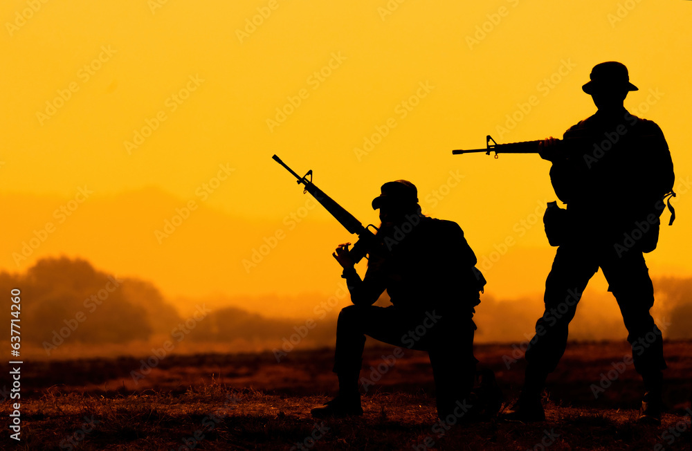 silhouette of a soldier with a rifle against the sky silhouette of a soldier with a rifle against the sky