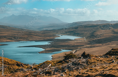 The high angle view of the Loch Leathan and Loch Fada from the footpath to the Old Man of Storr in sunny days photo
