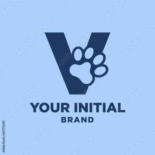 letter V paw print dog foot silhouette in negative space initial vector logo design