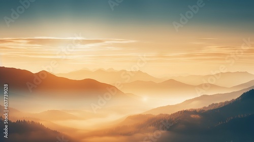 Sunlit mountain fog: blurred misty waves, warm colors, and bright sunlight. festive sky in orange hues with abstract evening flare on clouds