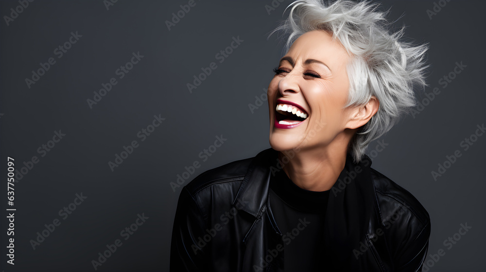 Radiant senior woman with modern white hair smiling, beauty in aging. Studio shot. Radiant senior woman with modern white hair smiling, beauty in aging. Studio shot.