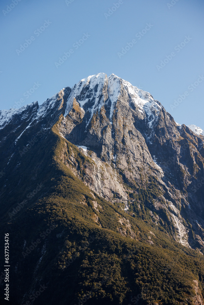 Mitre peak with a ridgeline running up to it Mitre peak with a ridgeline running up to it
