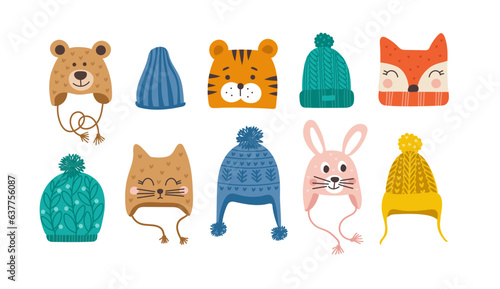 Cute vector winter hats set for boys and girls in cold weather.  Clothes for winter and autumn. Vector illustration.