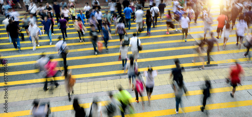 Photography Busy people on zebra crossing street in Hong Kong, China