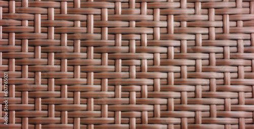 Fotografie Brown chair with basket weave pattern