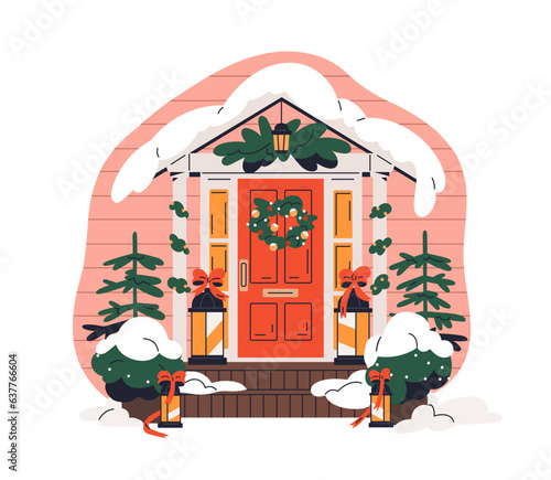 Front door with Christmas decorations. House entrance decorated with Xmas wre...