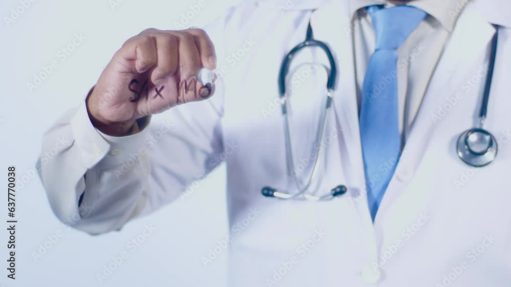 A doctor writes on the screen words Six months plan A doctor writes on the screen words Six months plan